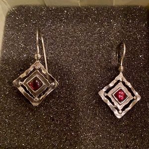 Silver earrings with red gem